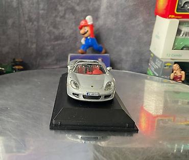 Avtomobil modelləri: Коллекционная модель Porsche Carrera GT Cabriolet type 980 silver — 9