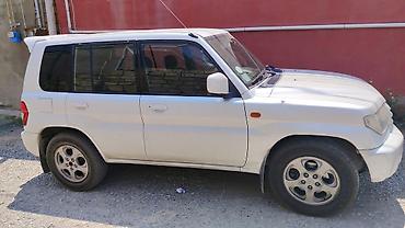 bez kraska aletleri: Mitsubishi Pajero iO (GDI) – ağ rəngli, 5 qapılı kompakt SUV — 3