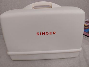 Paltar tikişi: Singer Fashion Mate 3333 Brend : Singer Rəng : White Gücü : 70 W Çəki — 8