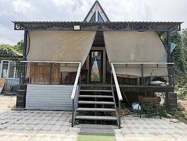 этажный дом: Каркасный дом A-Frame с большой крытой террасой — 1