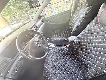 тойота королла е120: Toyota Corolla: 2002 г., Хэтчбэк — 7