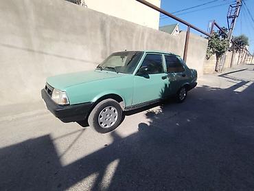 Tofas: Model: Tofaş Şahin (sedan) Kuzov: 4 qapılı, açıq yaşıl rəng Yanacaq — 4