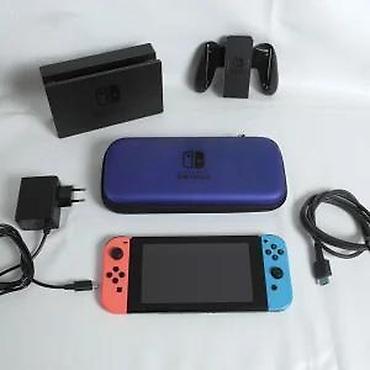Nintendo Switch: U ponudi je Nintendo Switch. Stanje: lepo očuvana, manji tragovi — 12