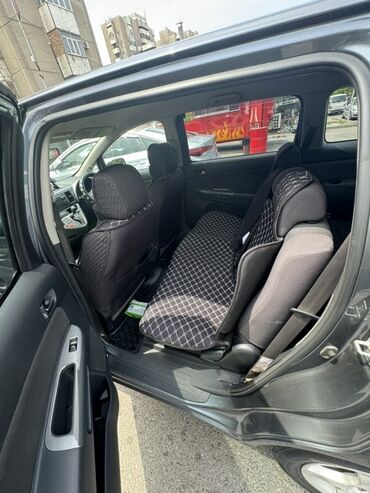 опель фронтера б: Автомобиль Toyota Wish серого цвета с просторным салоном. Задние