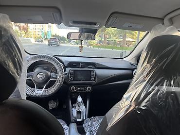 prado satisi: Nissan Versa (yeni nəsil) sedan – al qırmızı rəngli, şəhər üçün ideal — 8