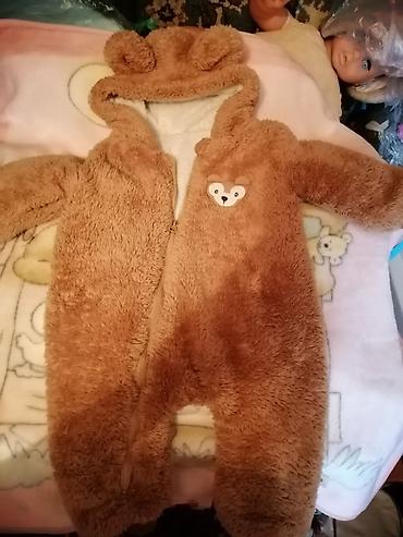 Верхняя одежда: Детские тёплые и на межсезонье комбезы б/у. Состояние хорошее. На — 3