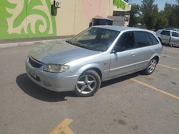 Унаа: Mazda 323: 2003 г., Кол менен иштөөчү, Бензин, Универсал — 8
