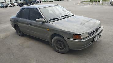 Транспорт: Mazda 323: 1990 г., Седан — 5