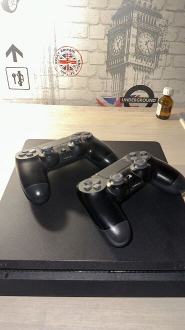 ps5 oyun diski: PlayStation 4 Slim oyun konsolu Komplekt: - PS4 Slim (qara rəng) - 2 at lalafo.az ps5 oyun diski: PlayStation 4 Slim oyun konsolu Komplekt: - PS4 Slim (qara rəng) - 2