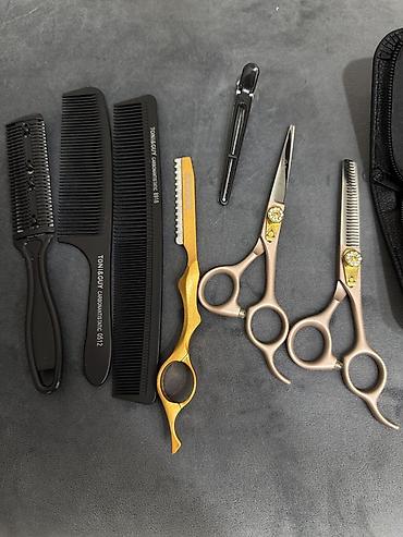 Digər alət dəstləri: Titan Professional bərbər qayçı dəsti Məhsulun tərkibi: - 1 ədəd düz — 15