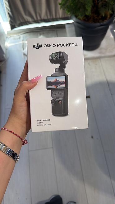 dji pocket 2 creator combo: DJI Osmo Pocket 4 – Creator Combo - Kompakt, cib ölçülü 3-oxlu — 1