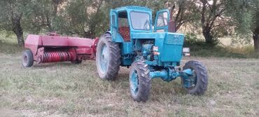 дом в колесах: Трактор с навесным оборудованием для заготовки сена - Колесный