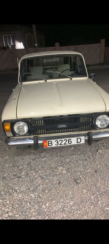 машына жугили: Автомобиль Москвич 412 в кузове седан, представленный в бежевом цвете