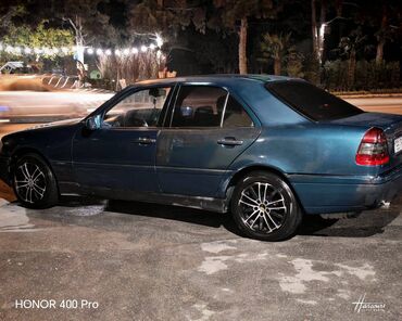 Mercedes-Benz: Mercedes-Benz 220: 2.2 l | 1995 il Sedan — 3