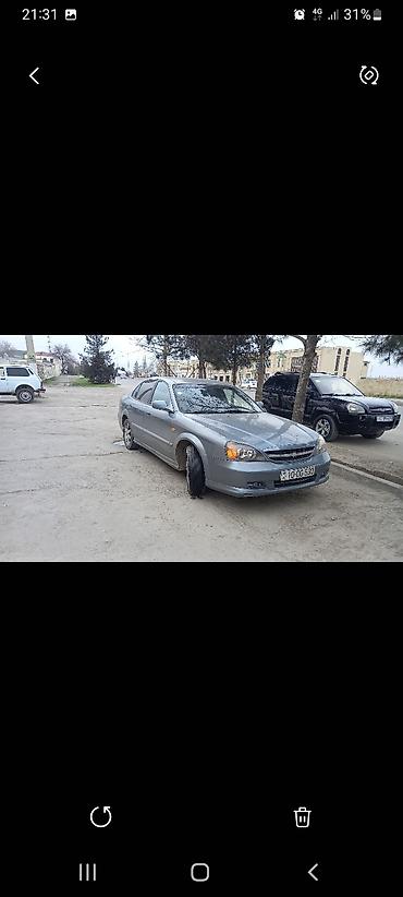 t 25 traktor satisi: Chevrolet Evanda: 2 l | 2005 il 35000 km Sedan — 6