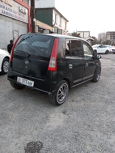 решетка харриер: Daihatsu Cuore: 2003 г., Бензин, Хэтчбэк — 2