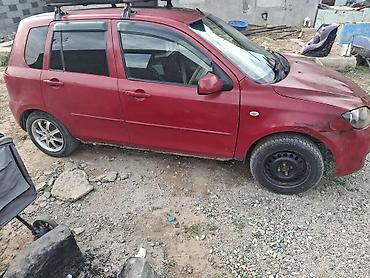 range over: Mazda Demio: 2002 г., 1.3 л, Бензин — 5