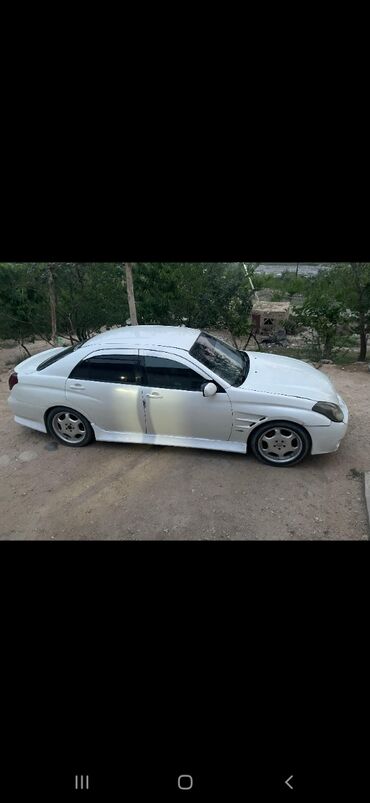 runx alex: Автомобиль Toyota Mark II в кузове седан. Белый цвет, установлены