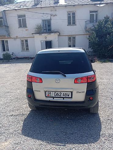 коврик: Mazda Demio: 2005 г., Автомат, Бензин, Хэтчбэк — 3