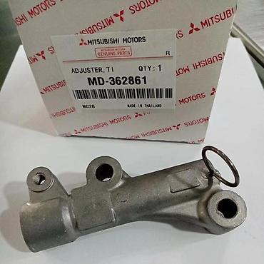6g74: Натяжитель Mitsubishi 2008 г., Новый, Аналог — 1
