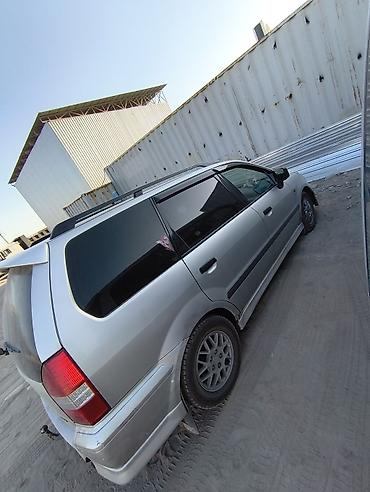 kugoo wish 01: Mitsubishi Space Wagon: 1998 г., 2.4 л, Механика, Бензин, Минивэн — 1