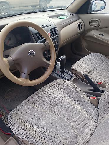 byd disk teker: Nissan Sunny: 1.3 l | 2008 il Sedan — 4