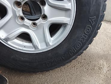 Колеса в сборе: Колесо в сборе: литой диск Toyota + шина Yokohama Geolandar I/T-S — 7