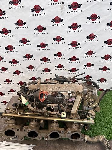 выпускной колектор: Коллектор Nissan Б/у, Оригинал, Япония — 1