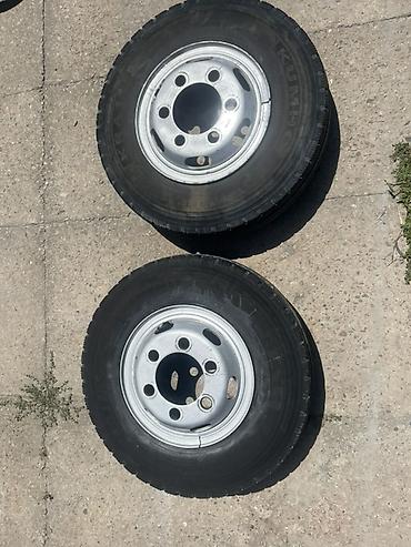 жёсткий тросс: Два грузовых колеса в сборе: диски + шины Kumho. Характеристики: - — 1
