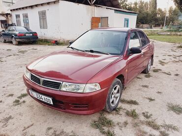 машина газ 66: Mitsubishi Lancer: 2000 г., 1.3 л, Автомат, Бензин, Седан