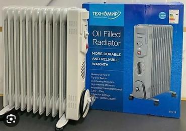 Масляные обогреватели: Масляный обогреватель Кол-во секций: 9, Отключение при падении, Защита от замерзания, Быстрый нагрев — 5