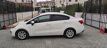 klas 6: Kia Rio: 1.6 l | 2014 il Sedan — 2