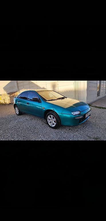 wel: Mazda 323: 1995 г., 1.5 л, Механика, Бензин, Хэтчбэк — 4