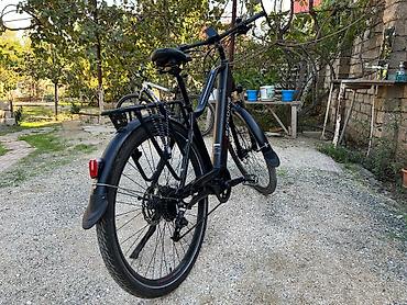 electro moto: İşlənmiş Elektrik velosipedi 28", sürətlərin sayı: 10, 750 < Vt, Ünvandan götürmə — 2