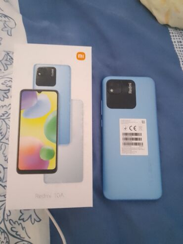 telefon ucun sekiller: Xiaomi Redmi 10A, 64 ГБ, цвет - Синий, 
 Отпечаток пальца, Face ID
