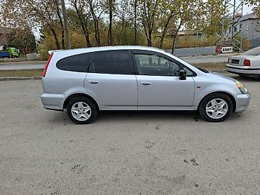 124 салон: Honda Stream: 2002 г., 2 л, Автомат, Бензин, Минивэн — 1