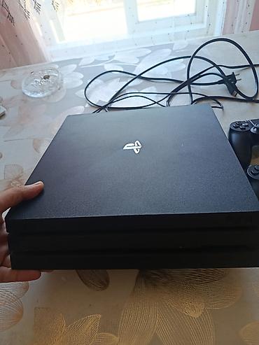 PS4 (Sony Playstation 4): Playstation 4 pro 9.0 proşivkali. Tam ideal vəziyyətdədir. 1 TB — 2