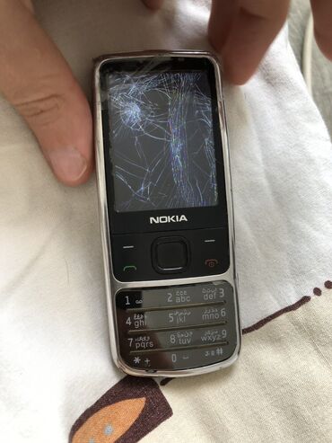 telefon nokia: Nokia 6700 Slide, rəng - Gümüşü, Qırıq