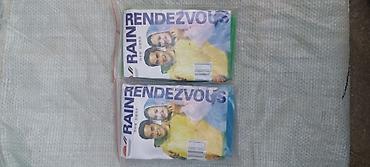 оптом кийим: Дождевик-плащ одноразовый RAIN RENDEZVOUS оптом по 70 сом в розницу по — 2