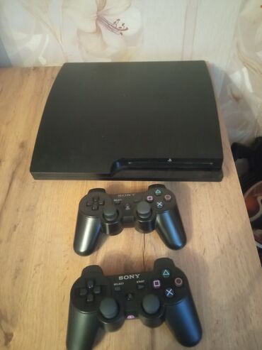 PS3 (Sony PlayStation 3): Playstation 3 slim satılır 2 dənə pult biri orginal. Içində 9 oyun