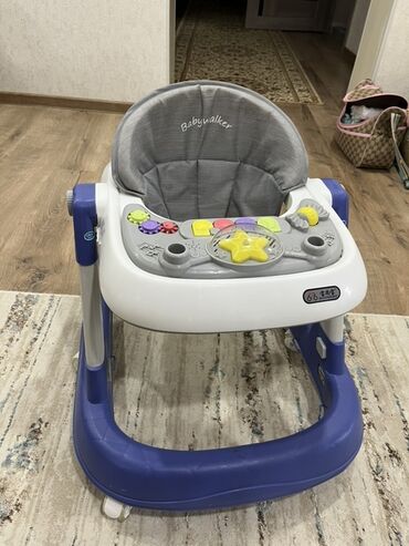 прогулочная коляска детская: Детские ходунки Babywalker с игровой панелью. Особенности: -