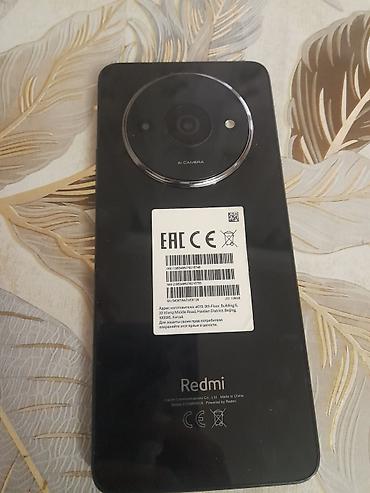 yeni modemler: Redmi A3, 128 GB, rəng - Qara, Düyməli — 1