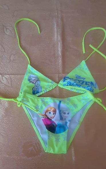 Digər qadın geyimləri: Bir neçə müxtəlif dizaynlı qadın köynəkləri təqdim olunur. Birincisi — 12