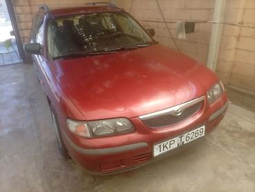 belarus 892 2: Mazda 626: 1999 г., 1.8 л, Механика, Бензин, Универсал — 7