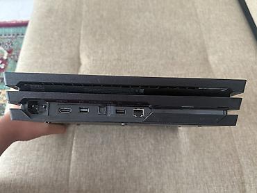 PS4 (Sony PlayStation 4): Игровая консоль Sony PlayStation 4 Pro Модель: CUH-7108B Серия — 5