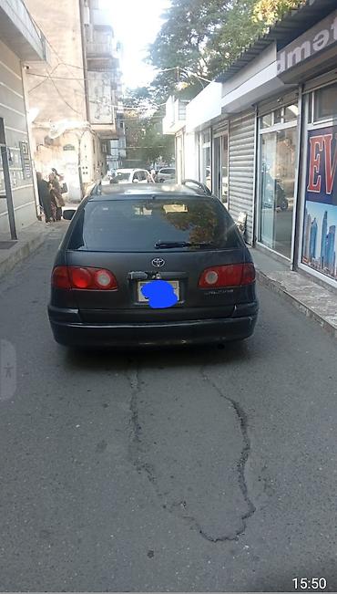 cesqa masin: Toyota Carina E Universal (station wagon) - Kuzov: universal, qara — 2