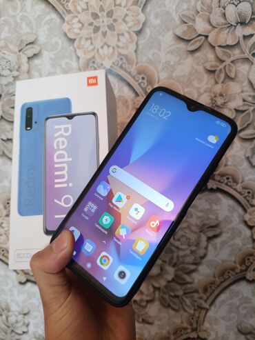 Xiaomi: Xiaomi Redmi 9T, 128 GB, rəng - Qara, 
 Sensor, Barmaq izi, İki sim kartlı