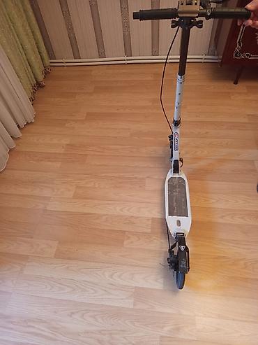 elektrik velo: Şəhər içi rahat hərəkət üçün yığma mexanizmlu skuter. Xüsusiyyətlər — 1