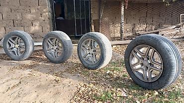 ступа: Комплект из 4 колес в сборе: литые диски + шины. 215.60.16. - — 3