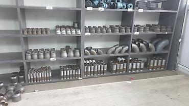 Другая сантехника: Металлическая деталь цилиндрической формы с несколькими кольцевыми — 30